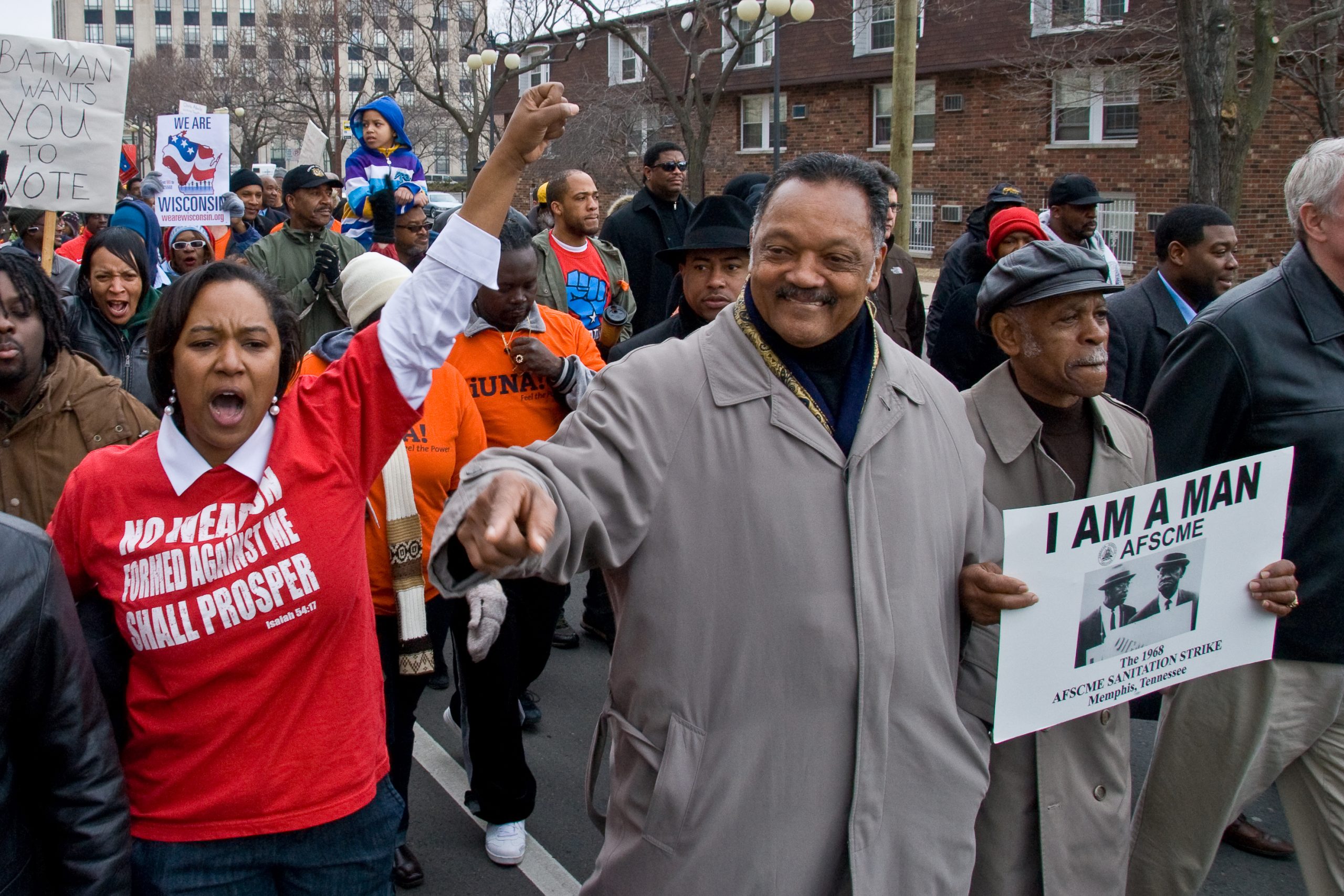 Reverend Jesse Jackson at an Early Vote March, April 1, 2011 (Photograph: Susan Ruggles, <a href='https://commons.wikimedia.org/wiki/File:Protest_0174_(50939248088).jpg' target='_blank'>Wikimedia Commons</a>)
