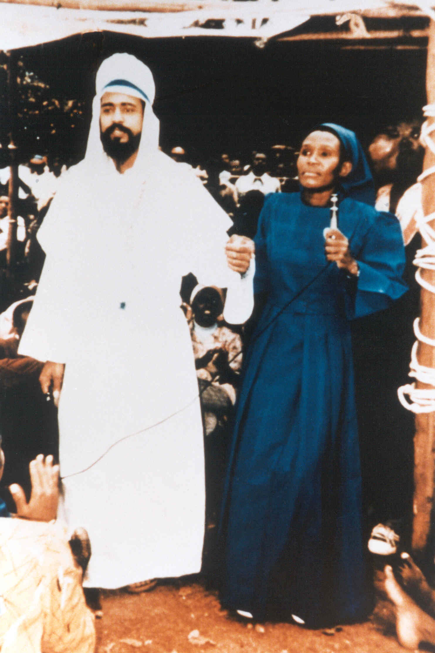 Maitreya, as He appeared miraculously, ‘out of the blue’, at a prayer meeting in Nairobi, Kenya on 11 June 1988. Right: healer Mary Akatsa.
